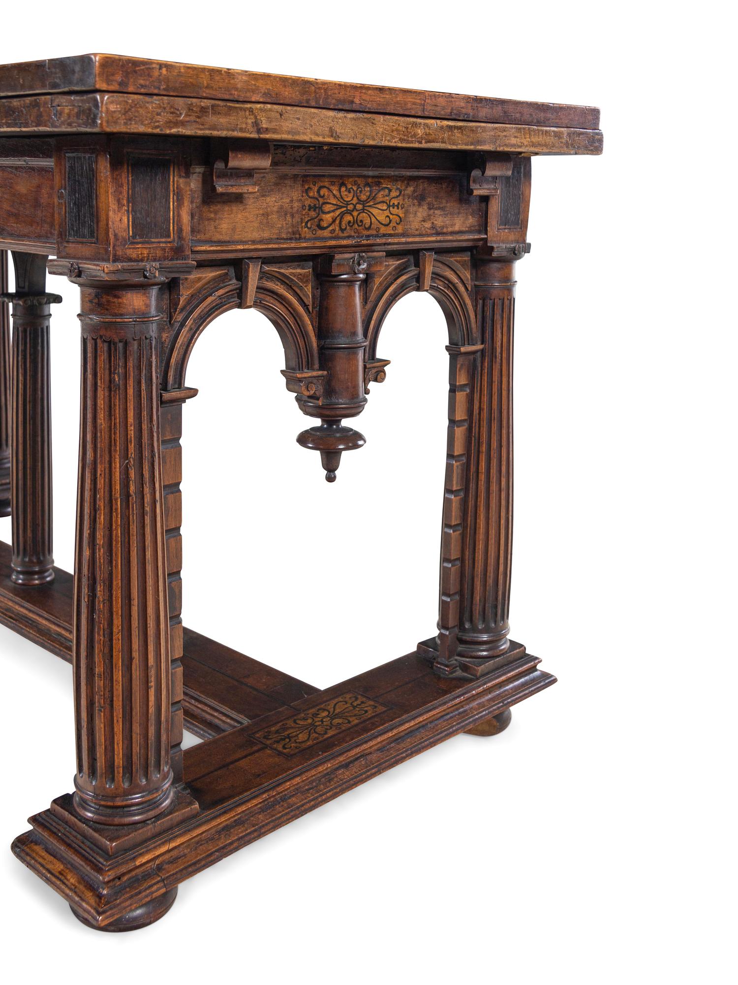 An Italian Walnut Extension Refectory Table