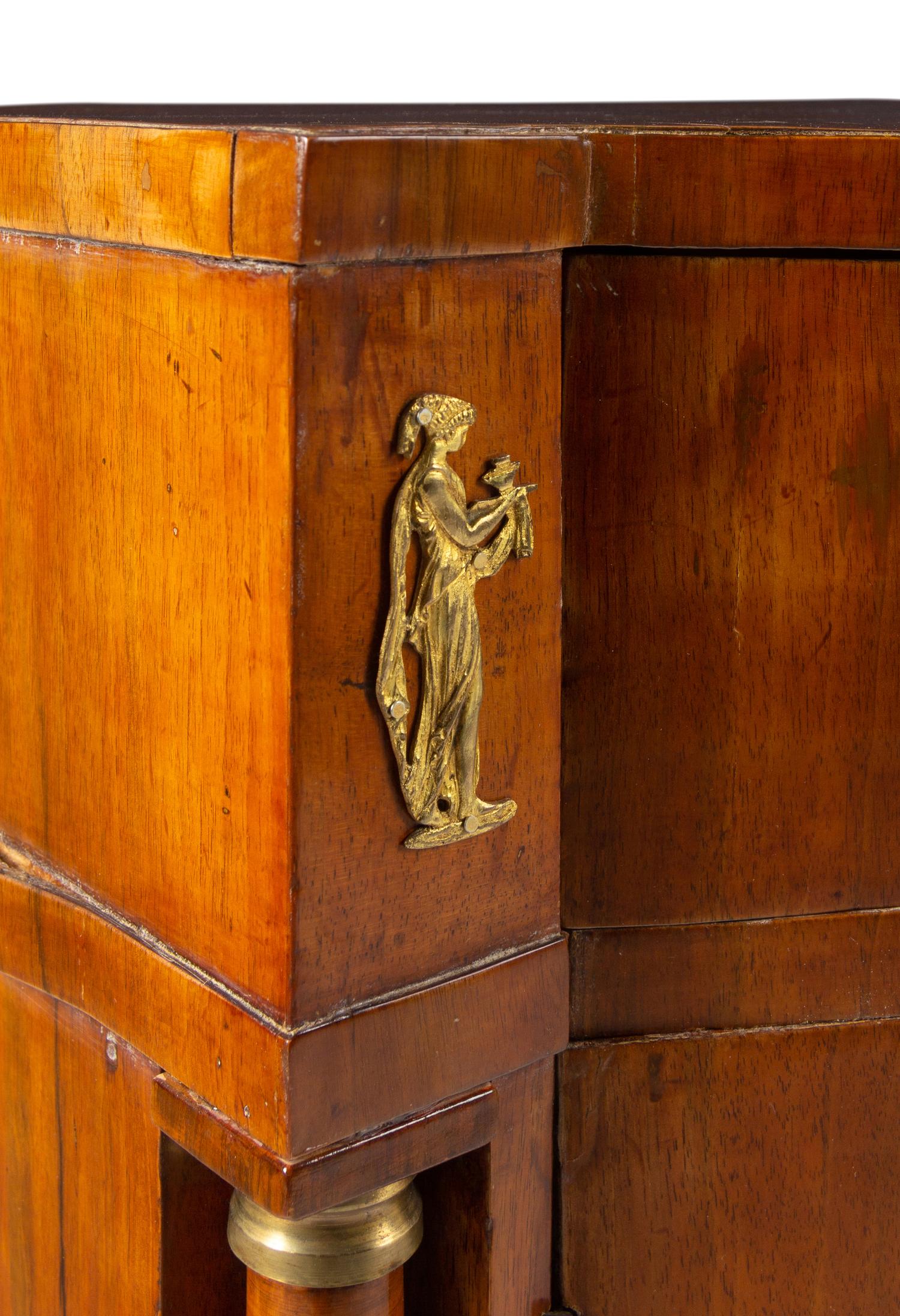 A North European Neoclassical Gilt Metal Mounted Mahogany Cabinet