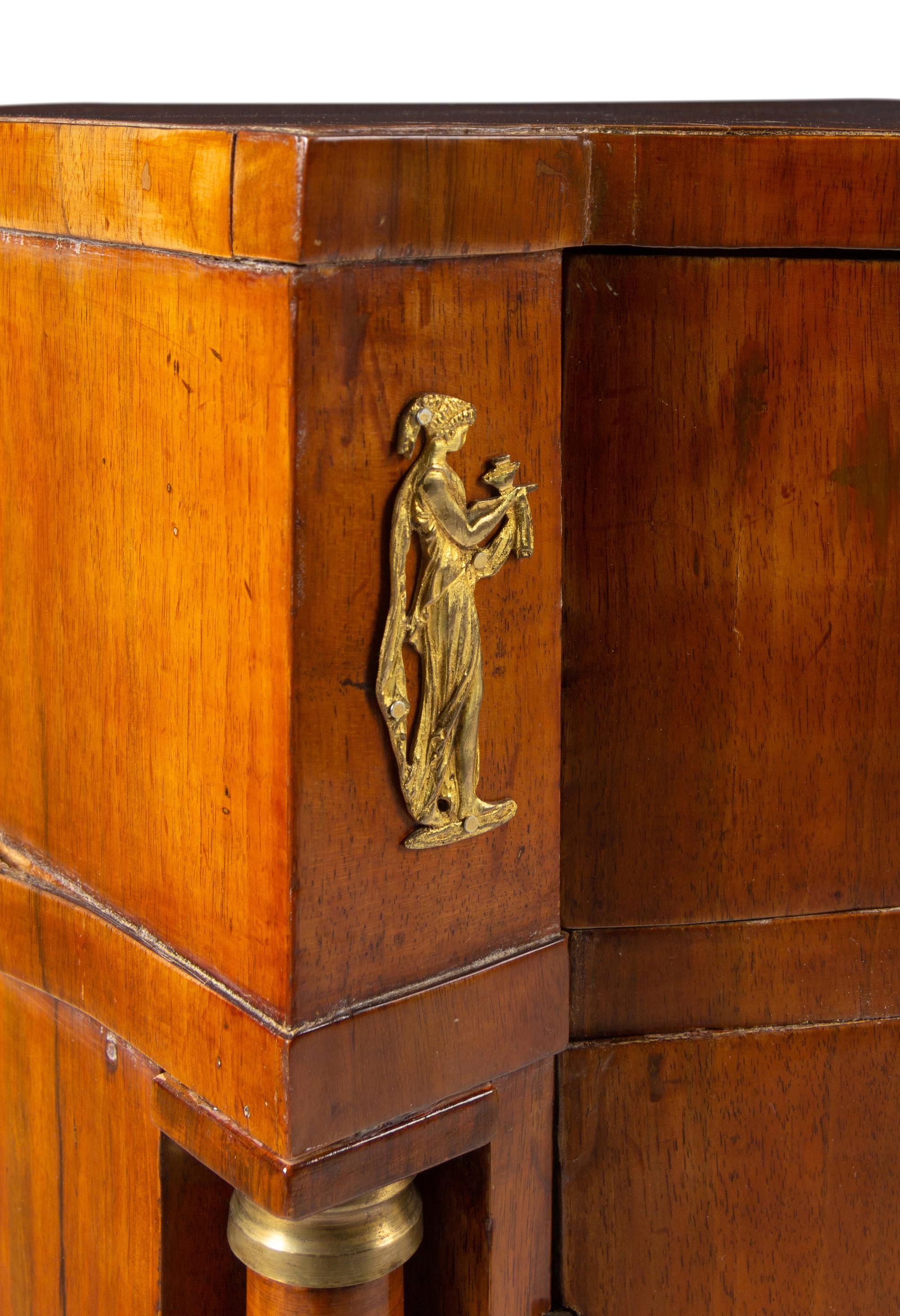 A North European Neoclassical Gilt Metal Mounted Mahogany Cabinet