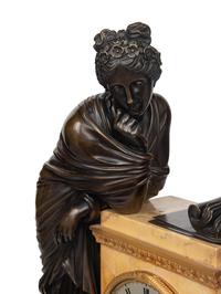 A Large Empire Gilt and Patinated Bronze and Marble Figural Clock