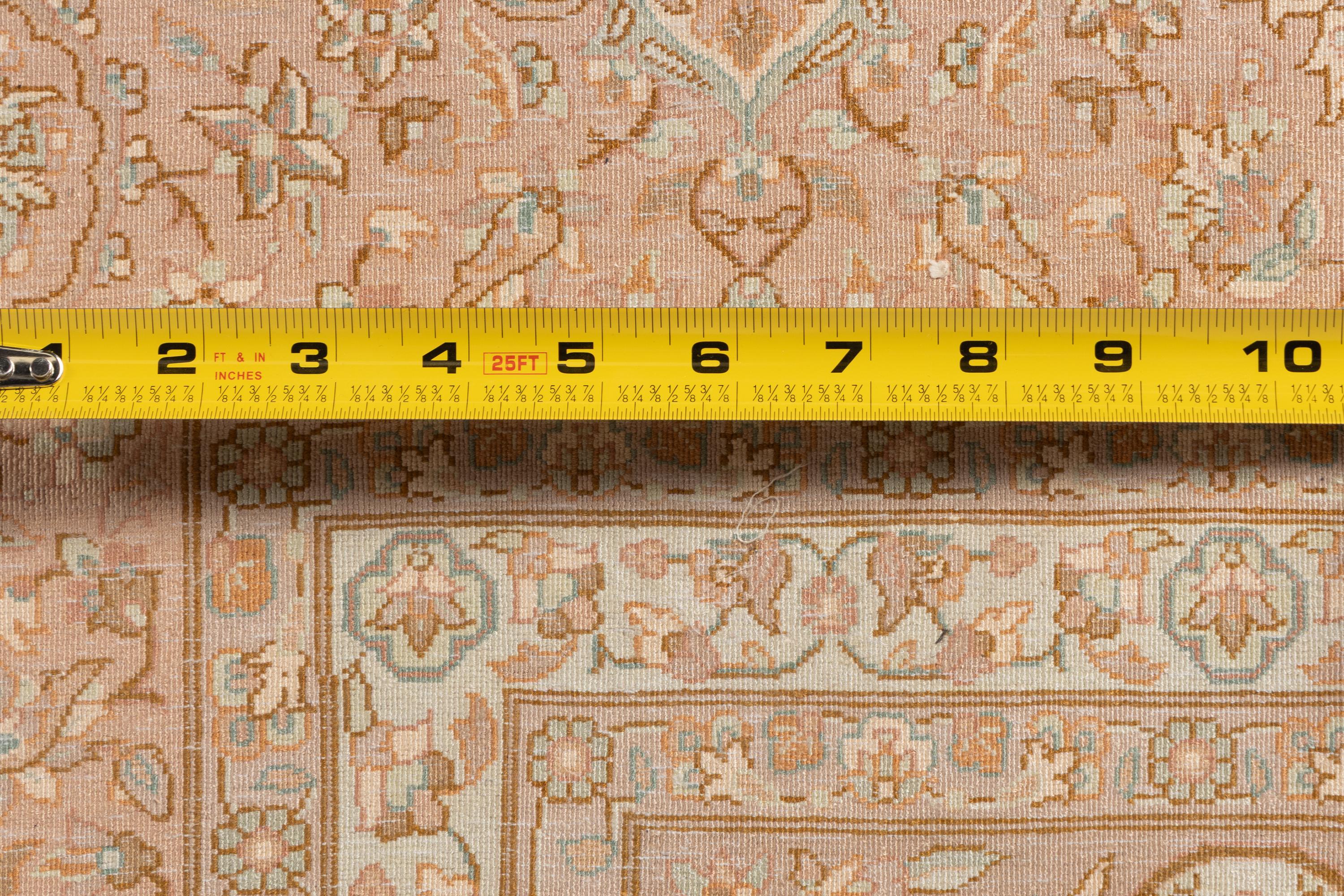 A Kirman Silk Carpet