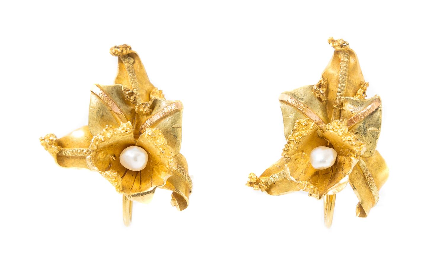 A Pair of 18 Karat Yellow Gold and Seed Pearl Orchid Earclips, 5.10 dwts.