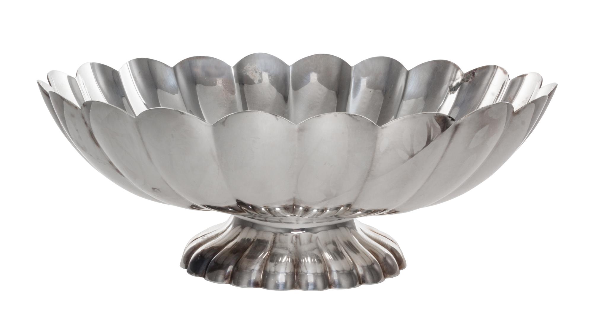 An American Silver-Plate Center Bowl, Reed & Barton, Taunton, MA, of oval form with ribbed sides and a similarly worked oval foot.
