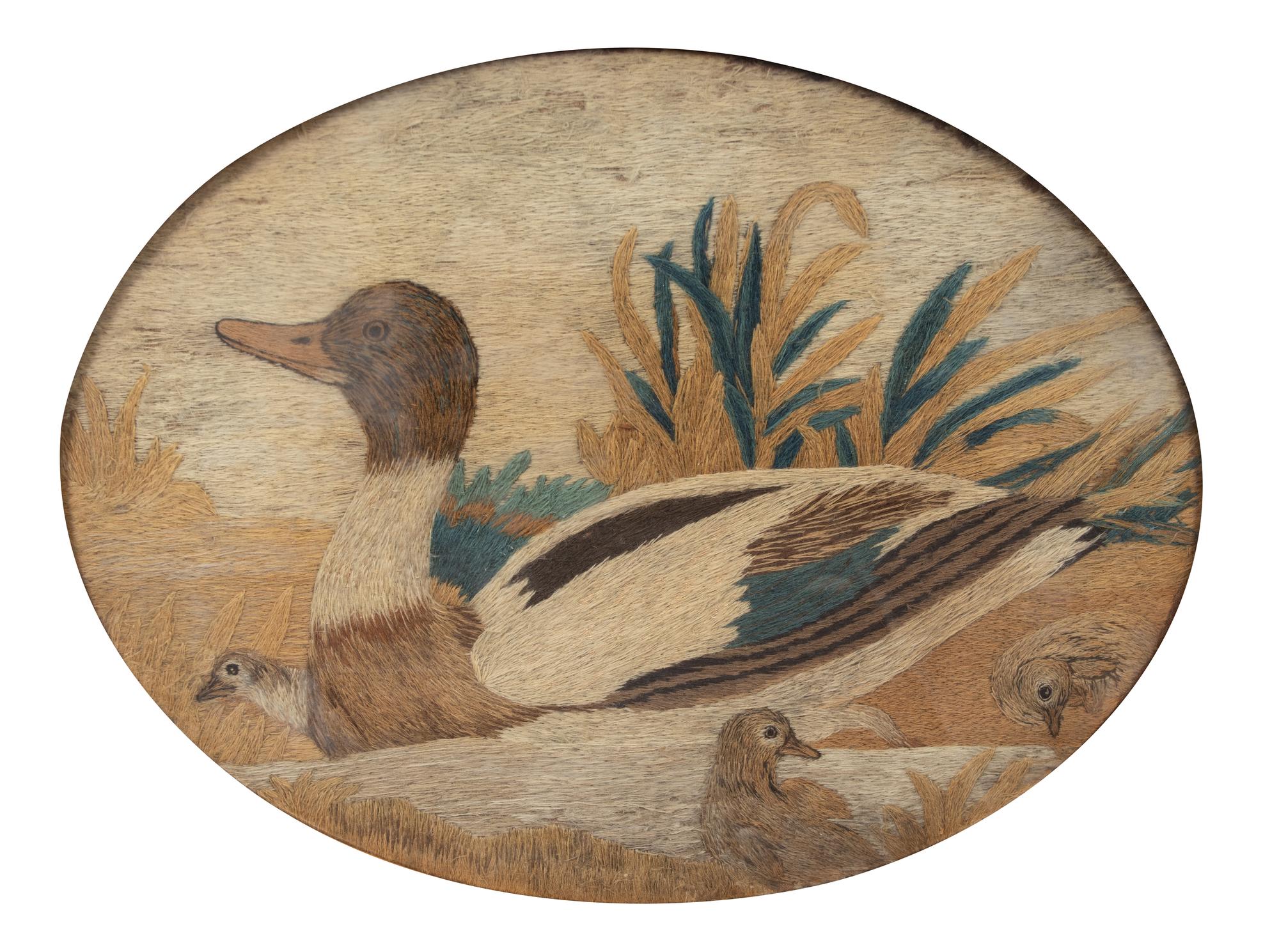 A Pair of American Wooly Embroidered Oval Panels in Gilt Frames Framed dimensions 19 x 23 inches. — LATE 19TH CENTURY