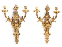 A Pair of Louis XVI Gilt Bronze Two Light Wall Sconces