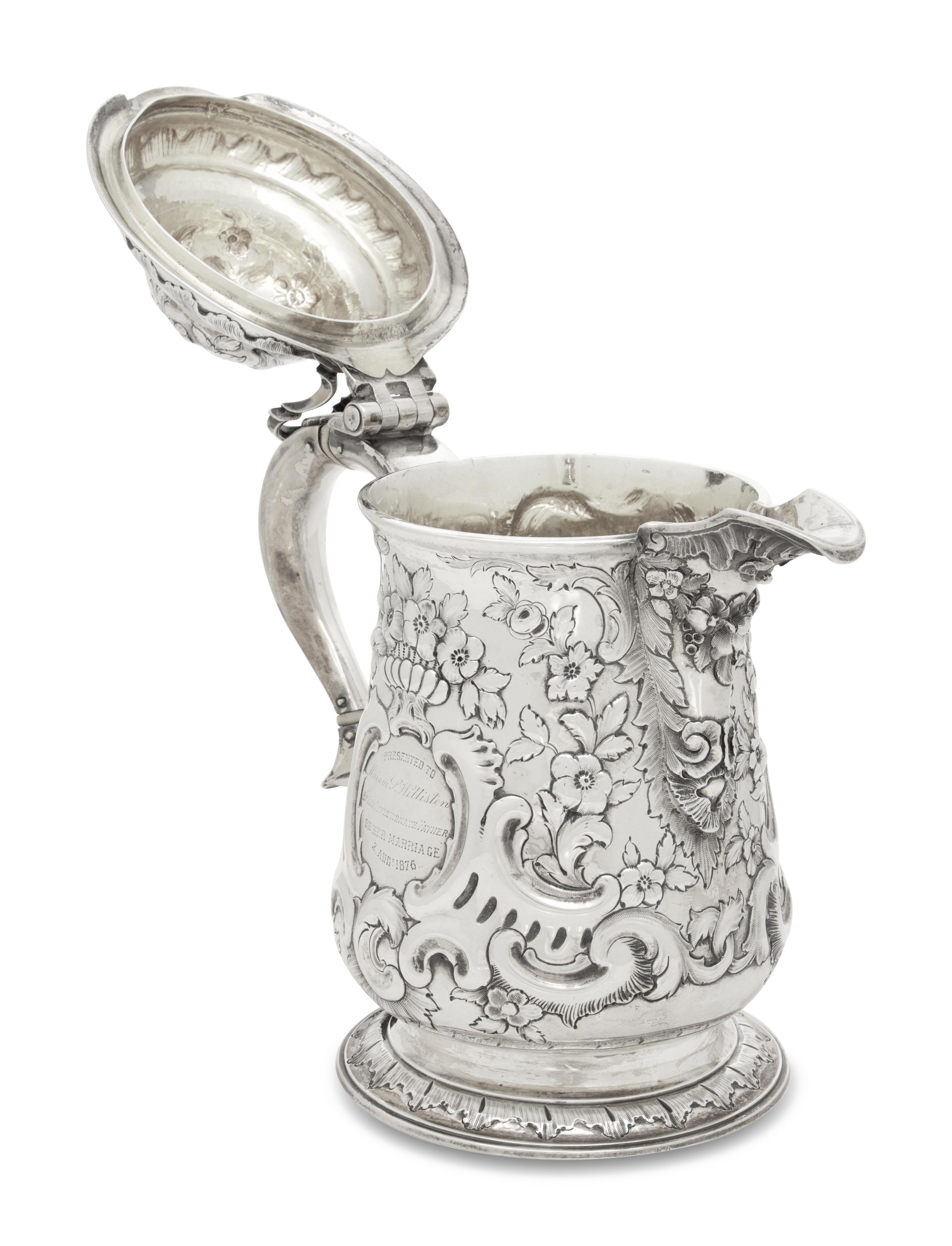 A George II Silver Covered Tankard