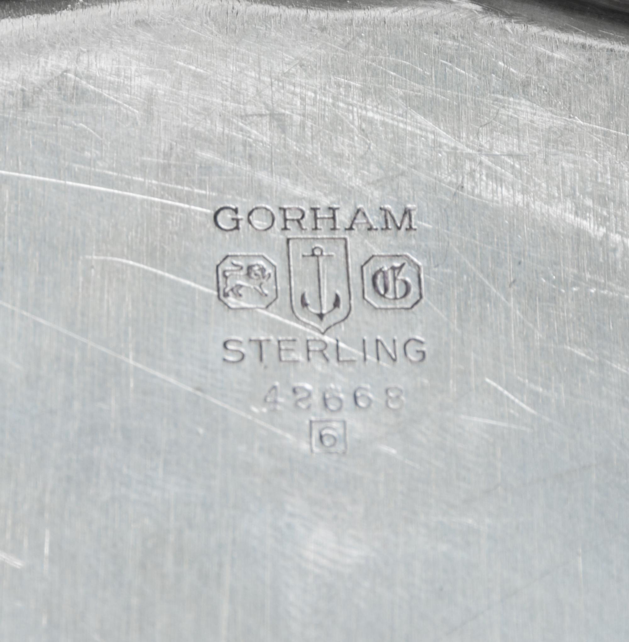 An American Silver Bowl, Gorham Mfg. Co., Providence, RI, Chippendale pattern, with a shaped circular border.