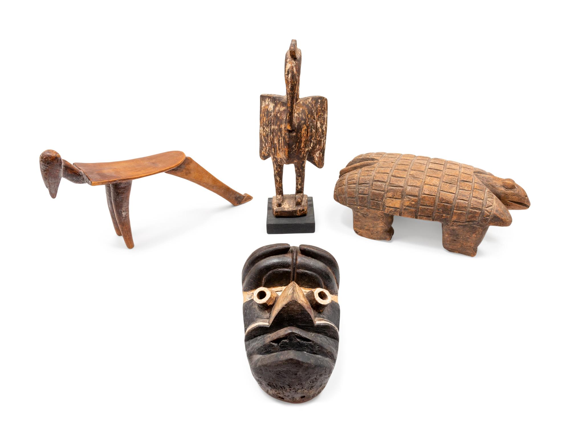 A Group of Carved Wooden African Objects