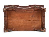A Chippendale Carved Mahogany Reverse Serpentine Chest of Drawers, 18th Century