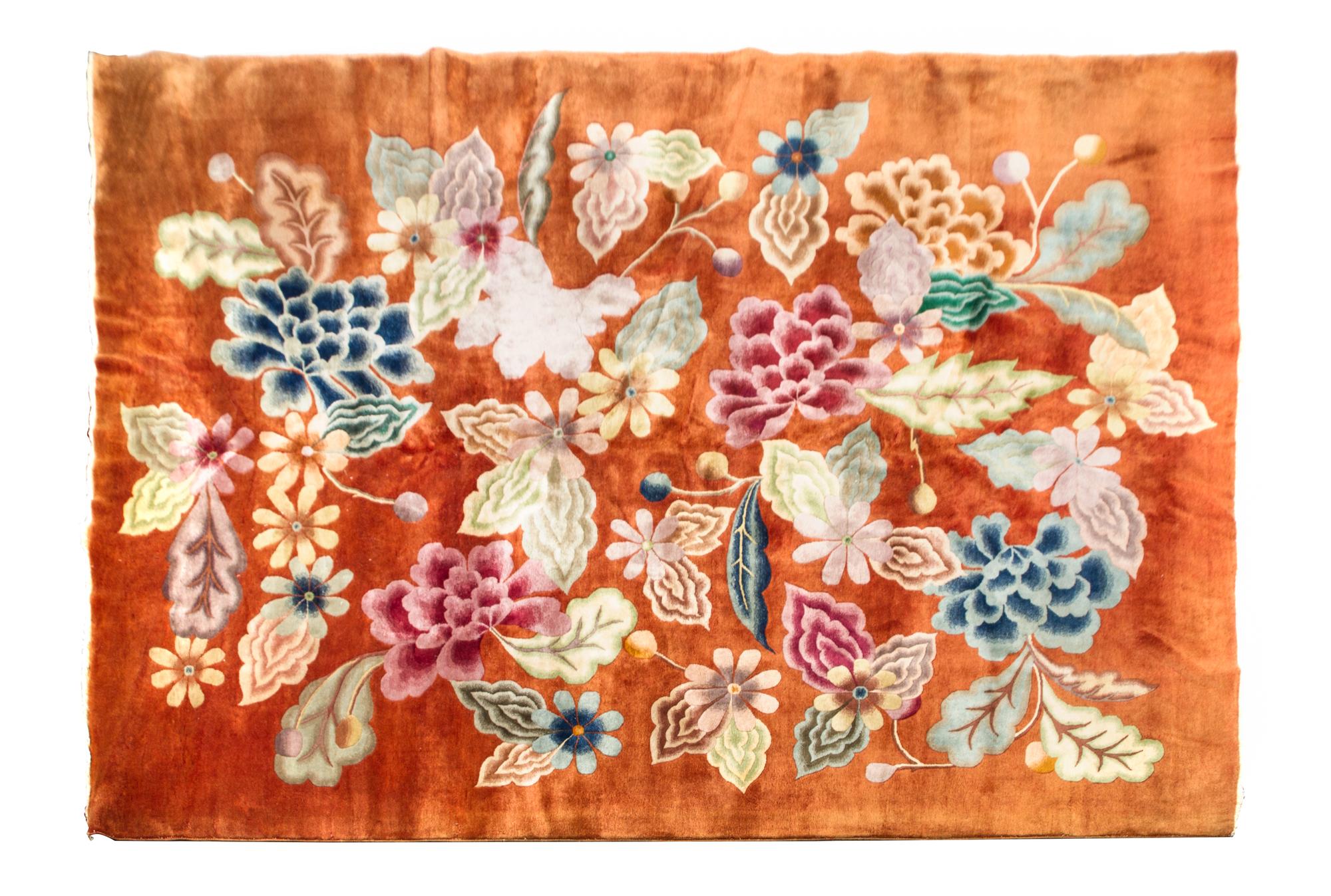 A Chinese Wool Rug 11 feet 5 inches x 8 feet 11 inches.