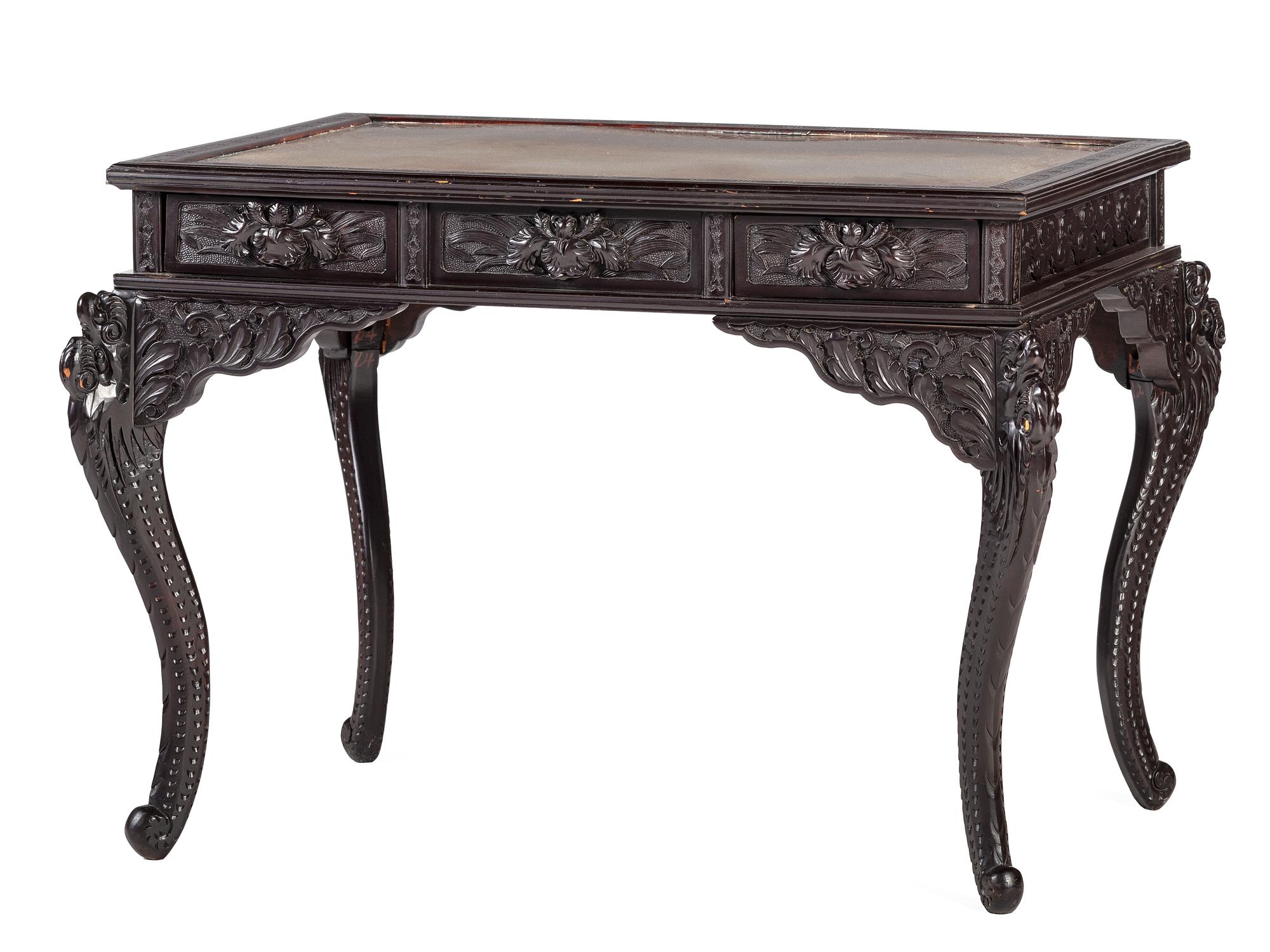 A Japanese Carved and Brass Inset Desk