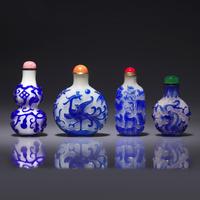 Four Chinese Blue Overlay Glass Snuff Bottles 涅白地套藍料鼻烟壺四支