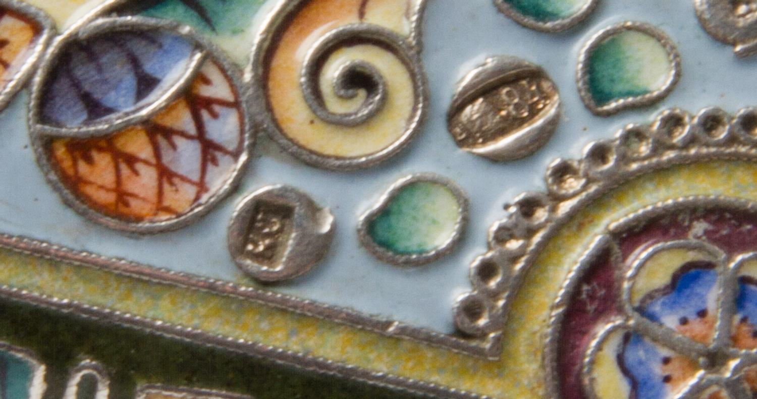 A Russian Enameled Silver Cigarette Case, Mark of Konstantin Skvortsov, Moscow, early 20th century, the case with polychrome floral, fo