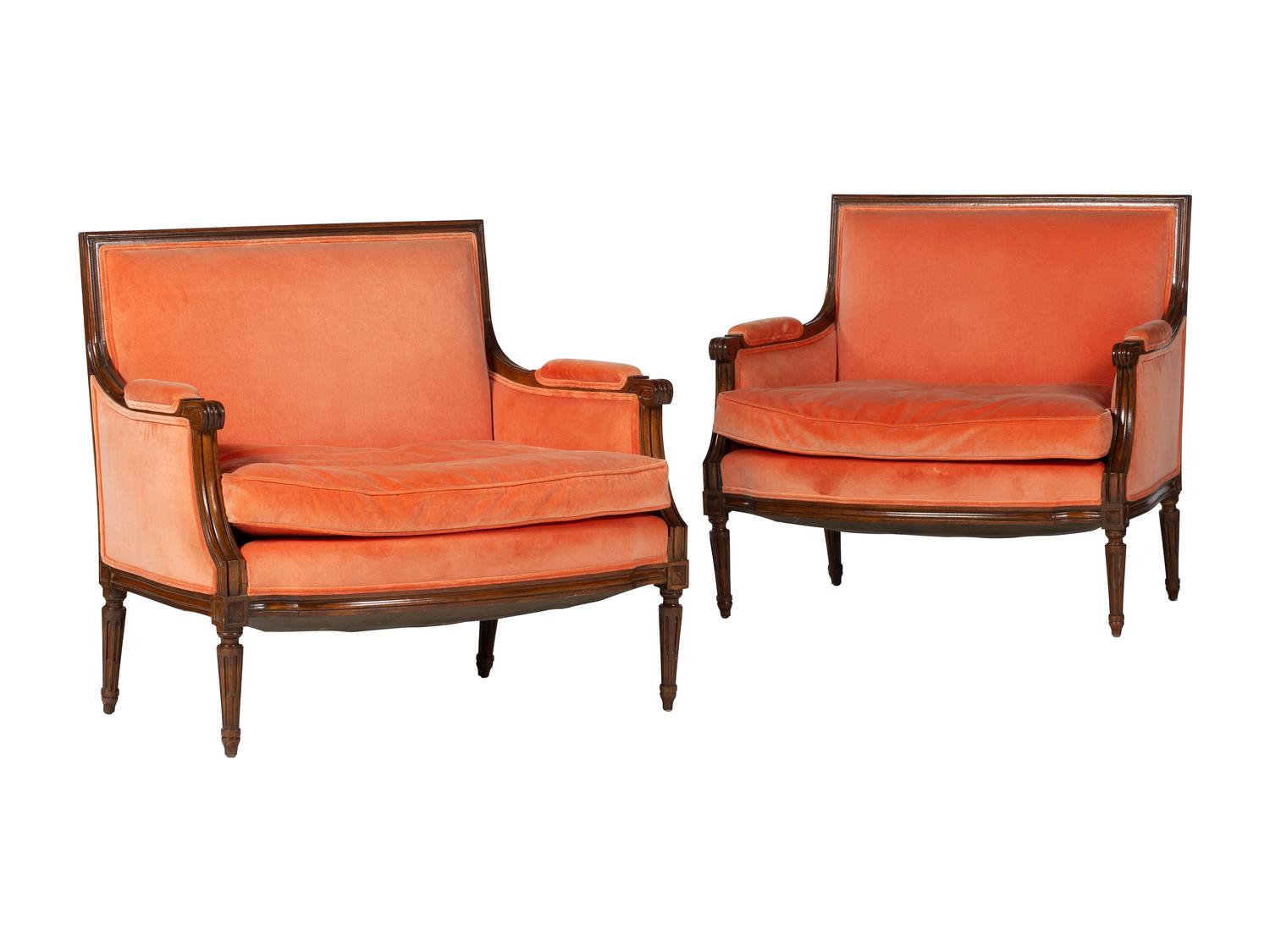 A Pair of Louis XVI Style Walnut Bergeres
