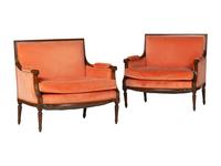 A Pair of Louis XVI Style Walnut Bergeres