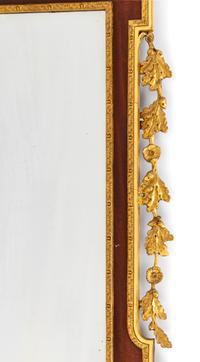 A George III Style Parcel Gilt Mahogany Mirror