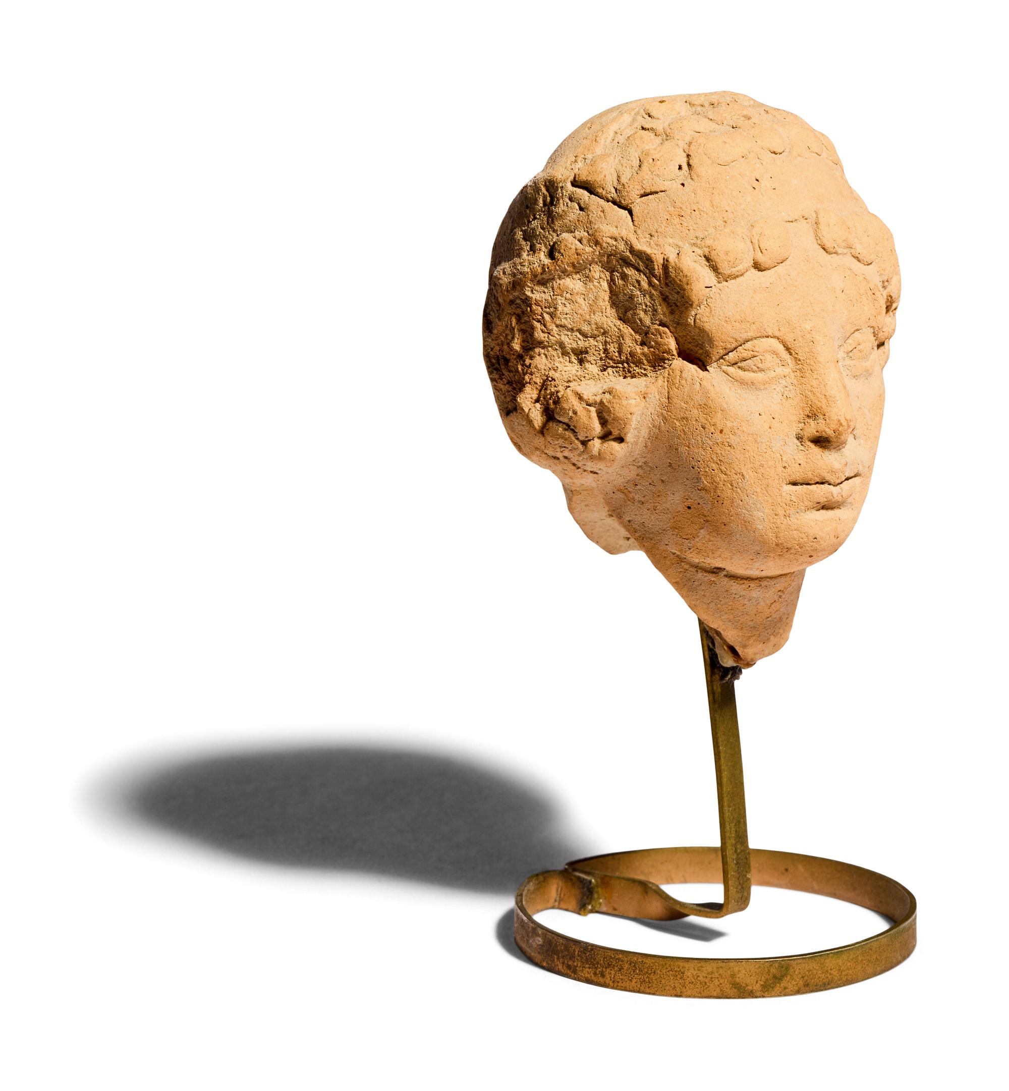 A Greek Terracotta Female Head
