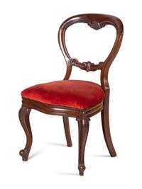 A Set of Four English Mahogany Balloon Back Side Chairs