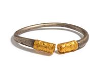 A Celtic Silver and Gold Bracelet