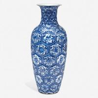 A Chinese blue and white porcelain molded vase decorated with Buddhist symbols and figures 青花佛家八宝瓶 19th century ????
