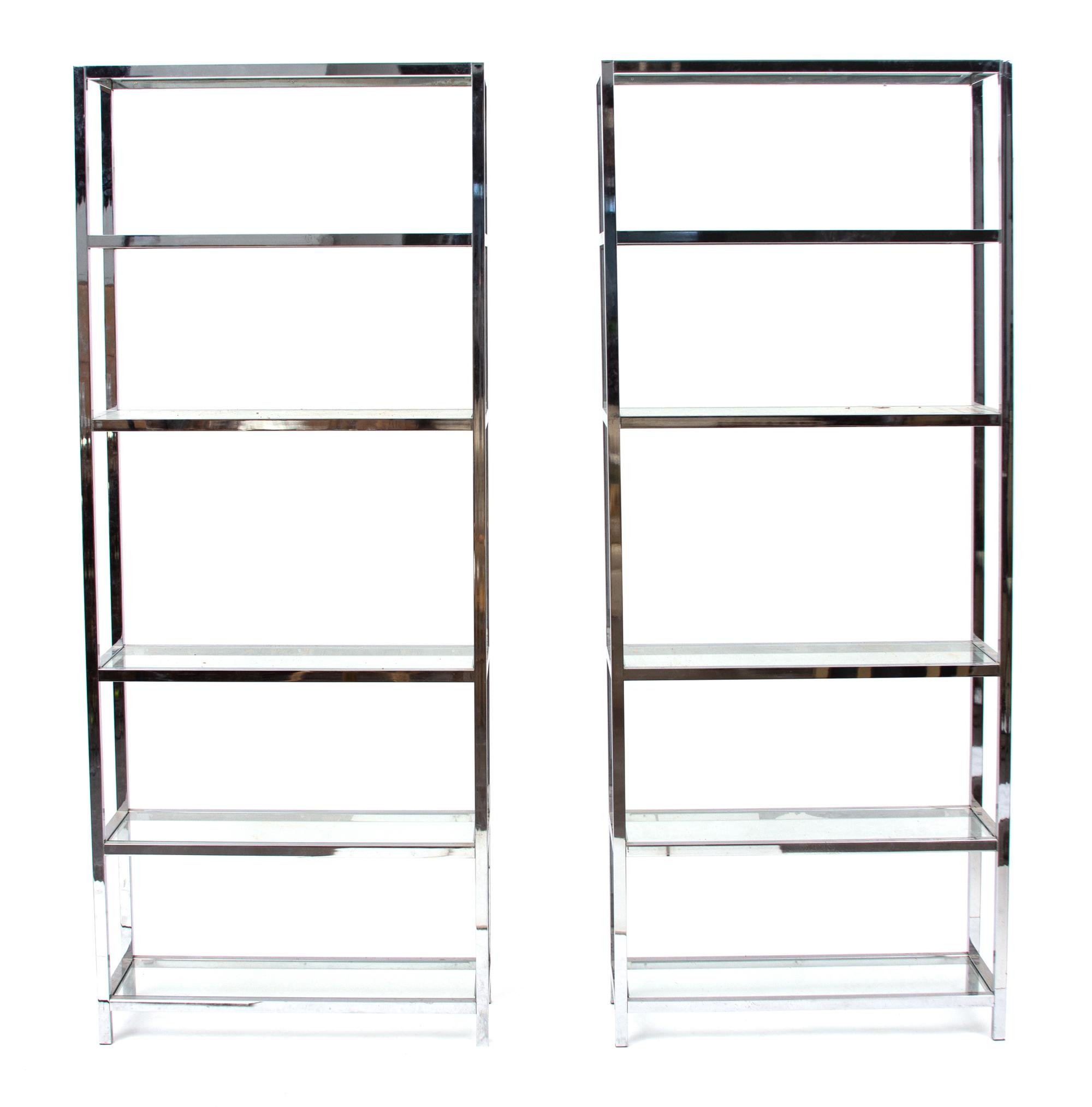 A Pair of Chromed Metal Book Cases Height 79 x width 32 x depth 12 inches. — 20TH CENTURY