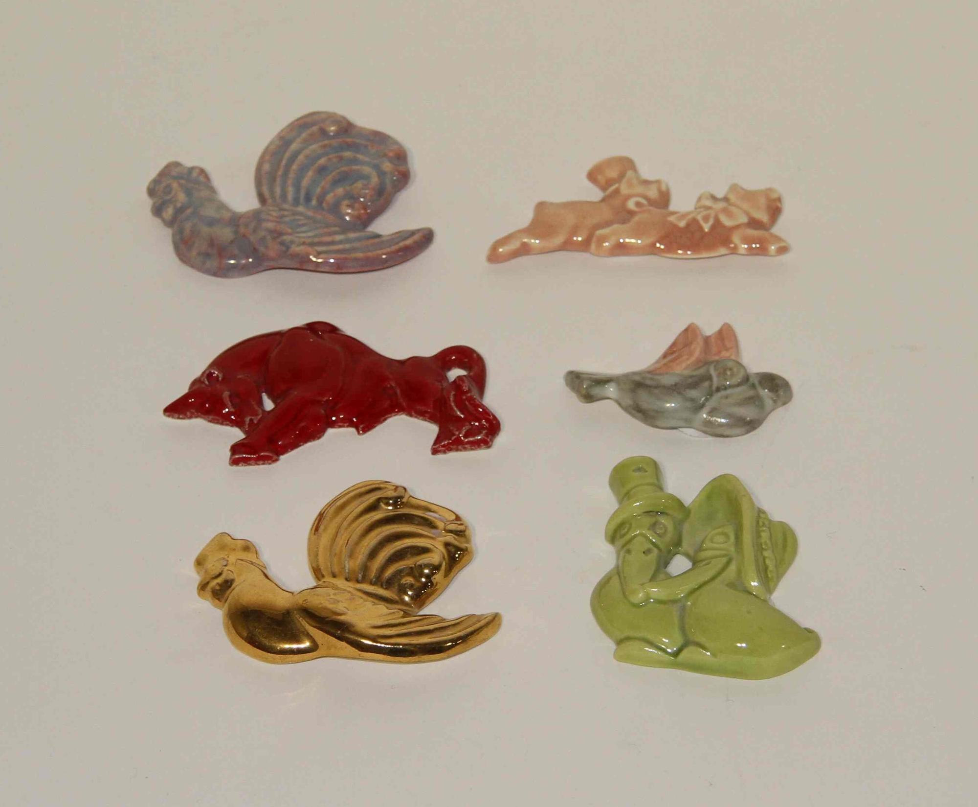 A Collection of Fifteen Haeger Pottery Animal Figures Width of largest 14 inches.