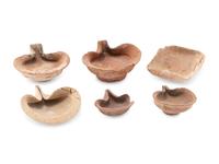 Six 'Shell Type' Terracotta Oil Lamps