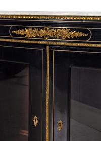 A Napoleon III Style Ebonized Marble-Top Cabinet