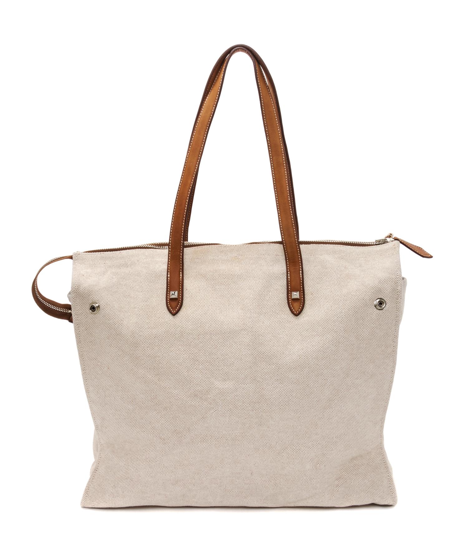 An Hermes Ecru Toile and Veau Barenia Mira Tote Bag, 14" x 14" x 5.5".