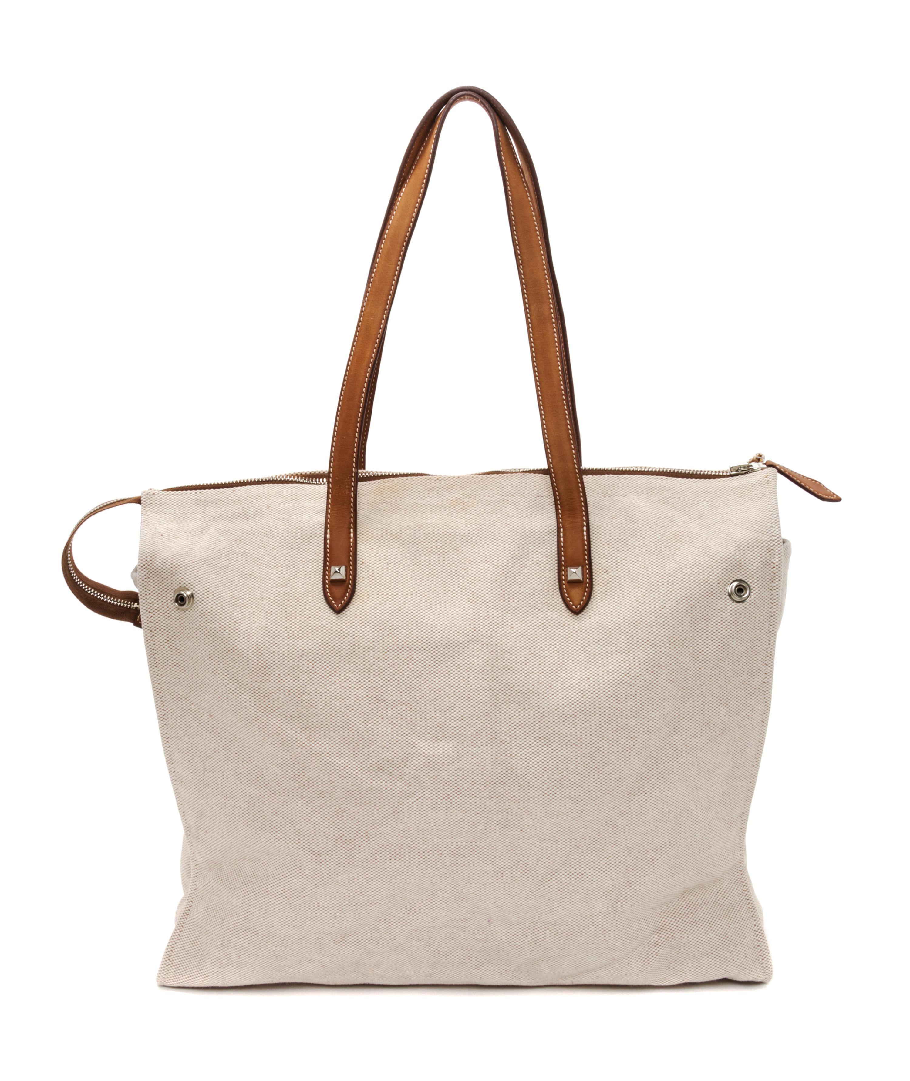 An Hermes Ecru Toile and Veau Barenia Mira Tote Bag, 14" x 14" x 5.5".