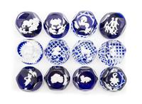 Baccarat , , fourteen zodiac sulphide paperweights