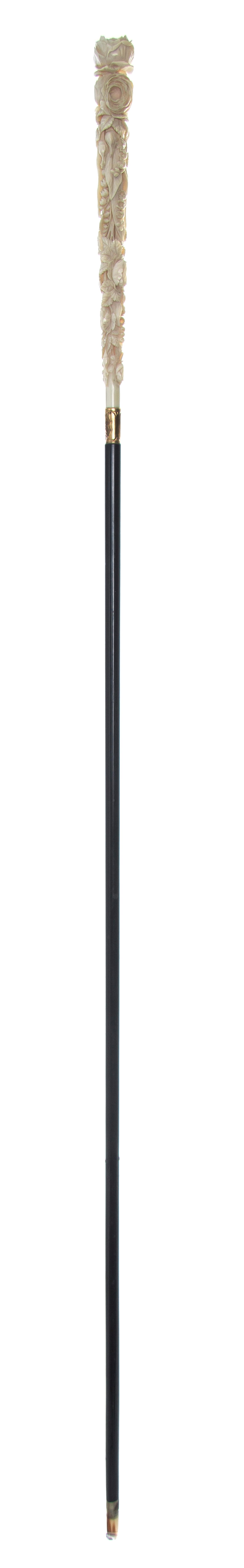 A Continental Ivory Handled Lady's Walking Stick, Length of handle 10 1/4 x length overall 44 3/4 inches.