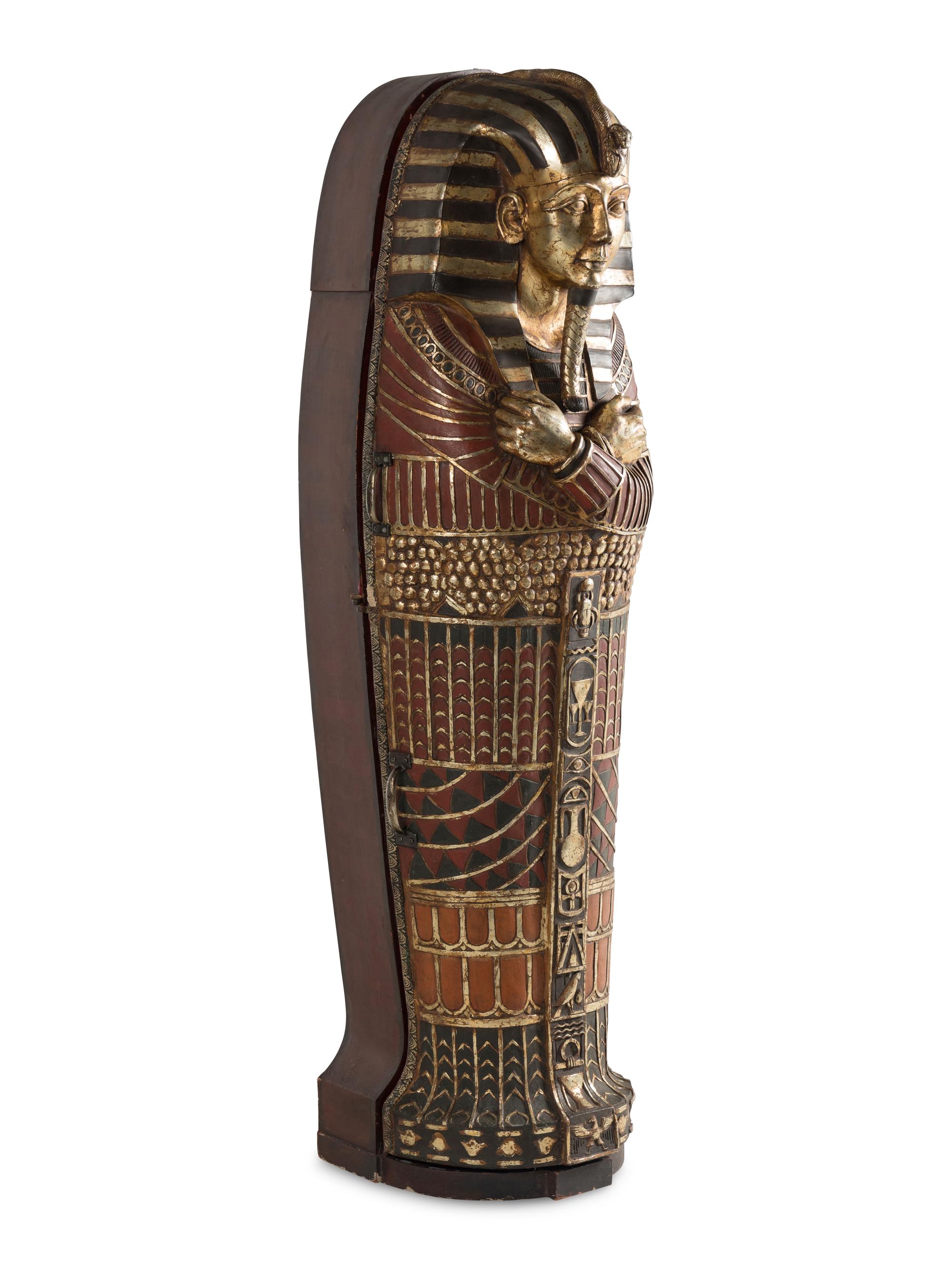A Continental Carved and Painted Wood Sarcophagus-Form Bar Cabinet