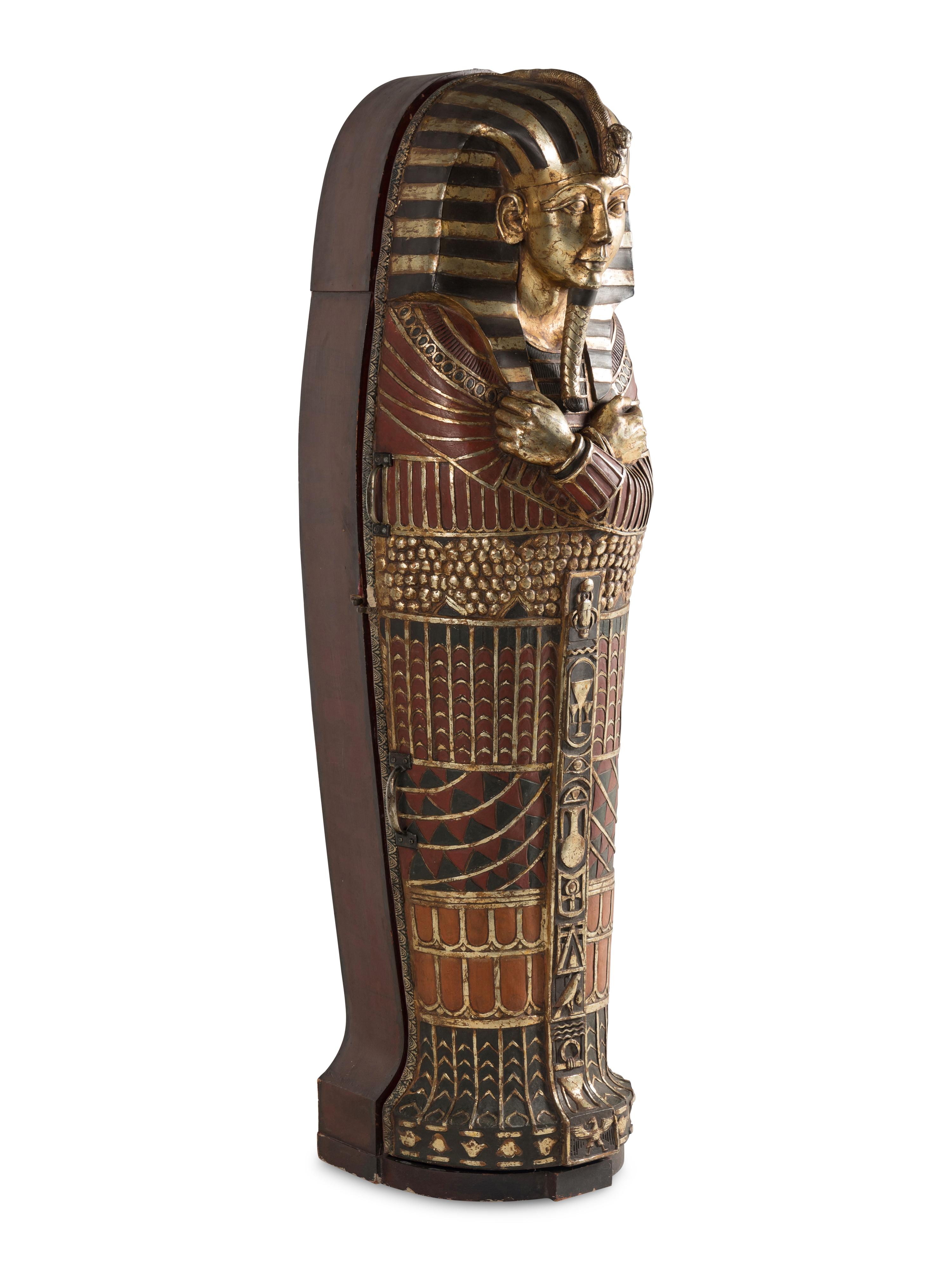 A Continental Carved and Painted Wood Sarcophagus-Form Bar Cabinet