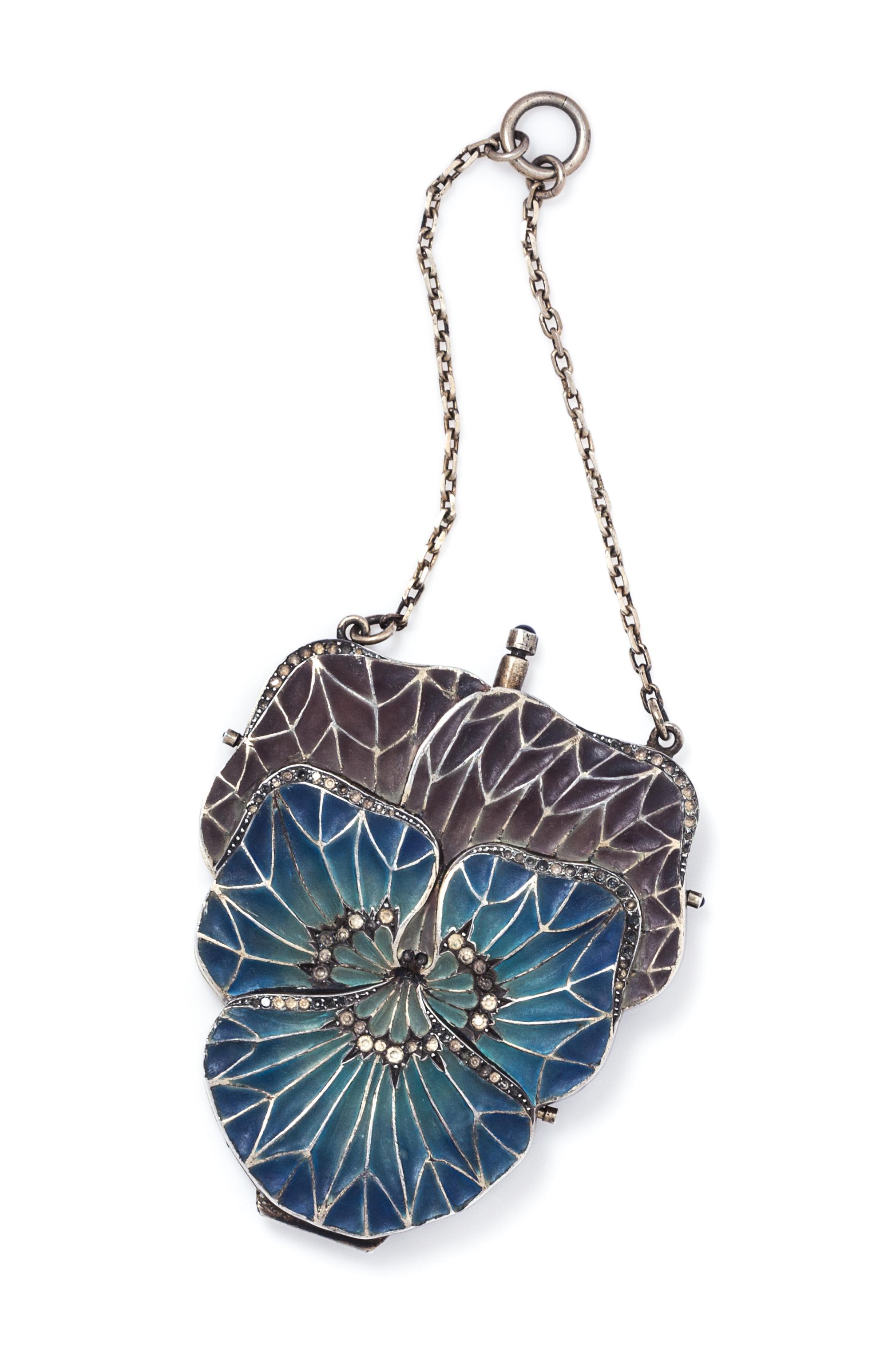 An Art Nouveau Sterling Silver, Plique-a-Jour Polychrome Enamel and Paste Necessaire, 73.60 dwts.
