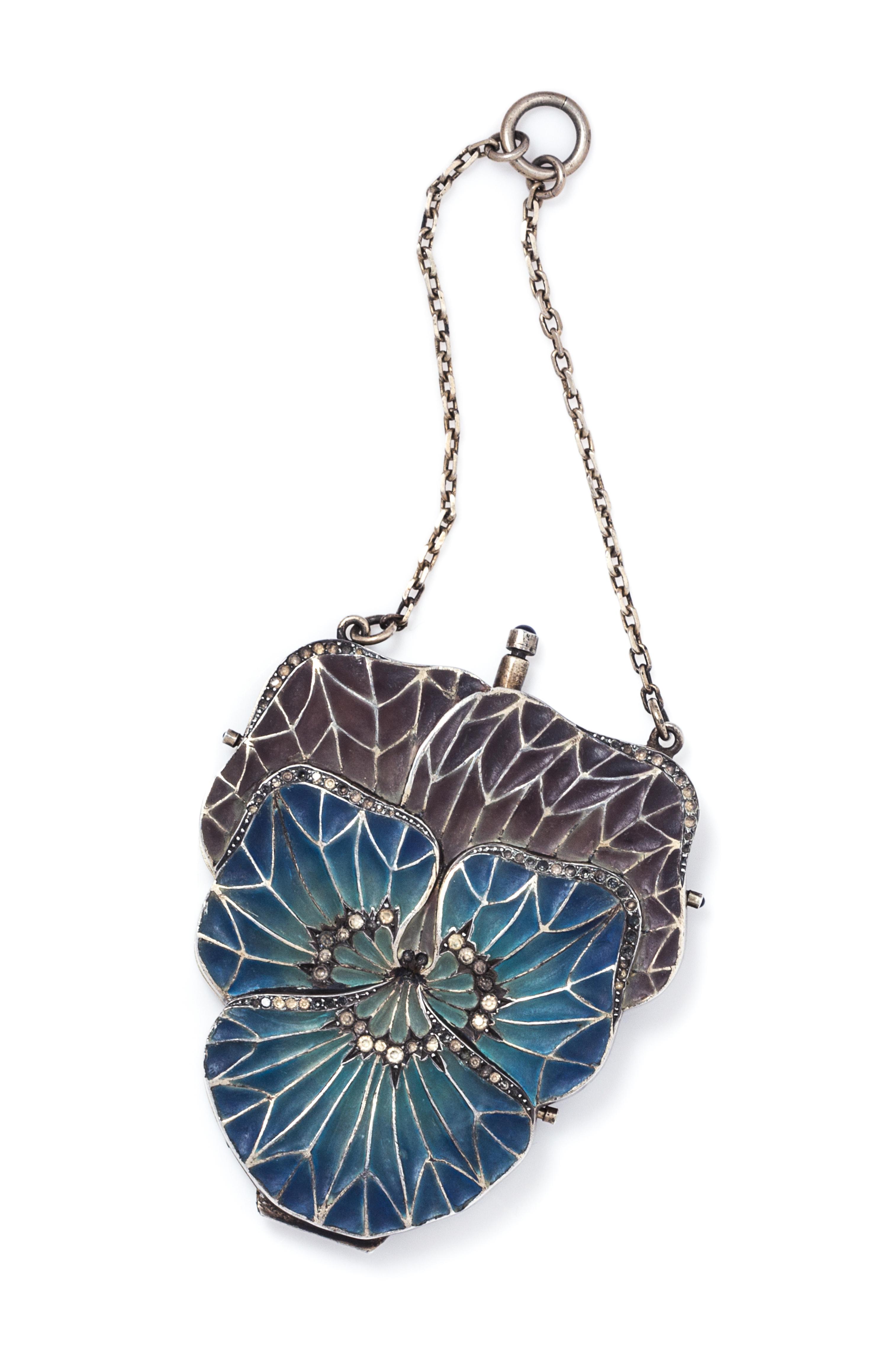 An Art Nouveau Sterling Silver, Plique-a-Jour Polychrome Enamel and Paste Necessaire, 73.60 dwts.