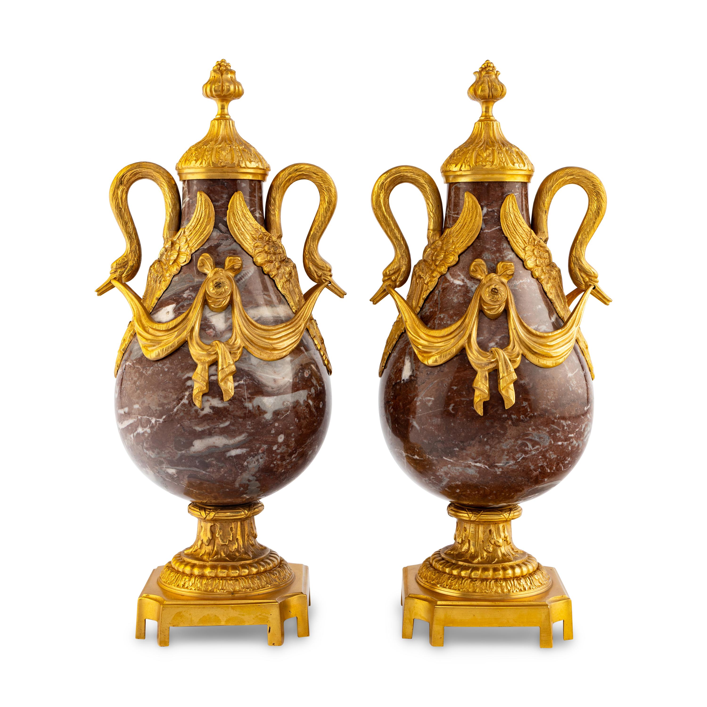 A Pair of Louis XVI Style Gilt Bronze Mounted Marble Urns