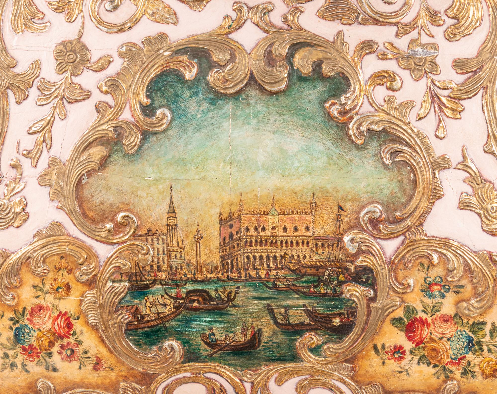 A Venetian Style Painted and Parcel Gilt Transom Panel