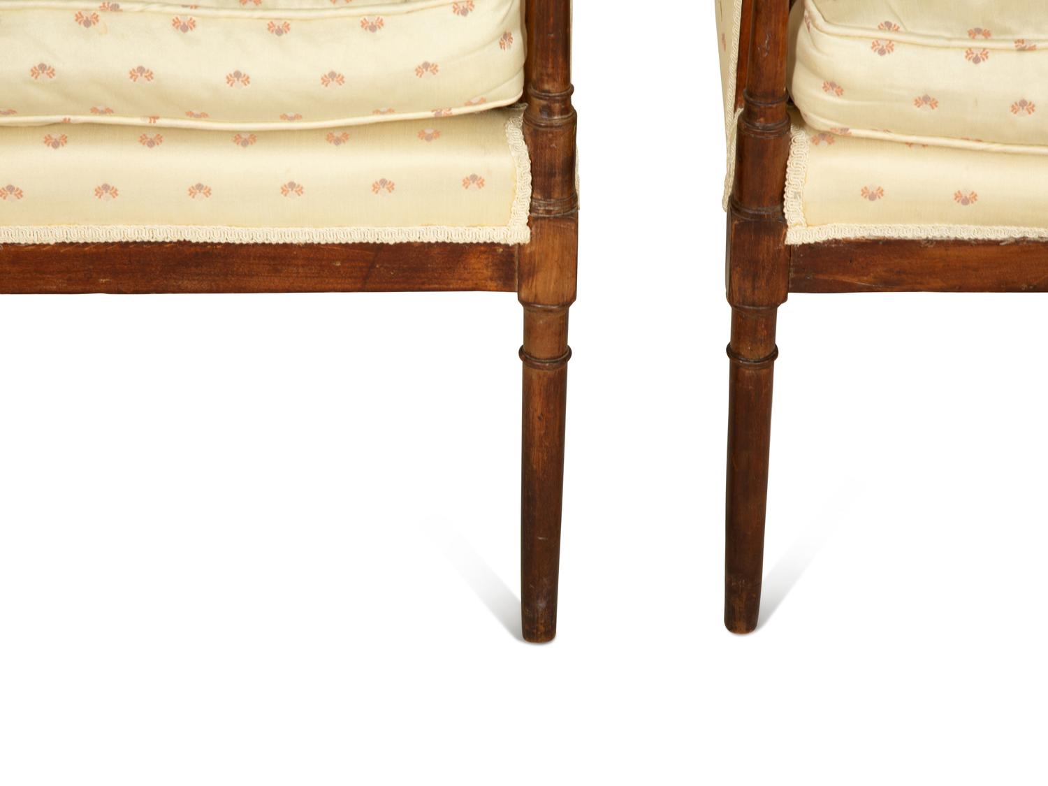 A Pair of Directoire Style Fruitwood Bergères