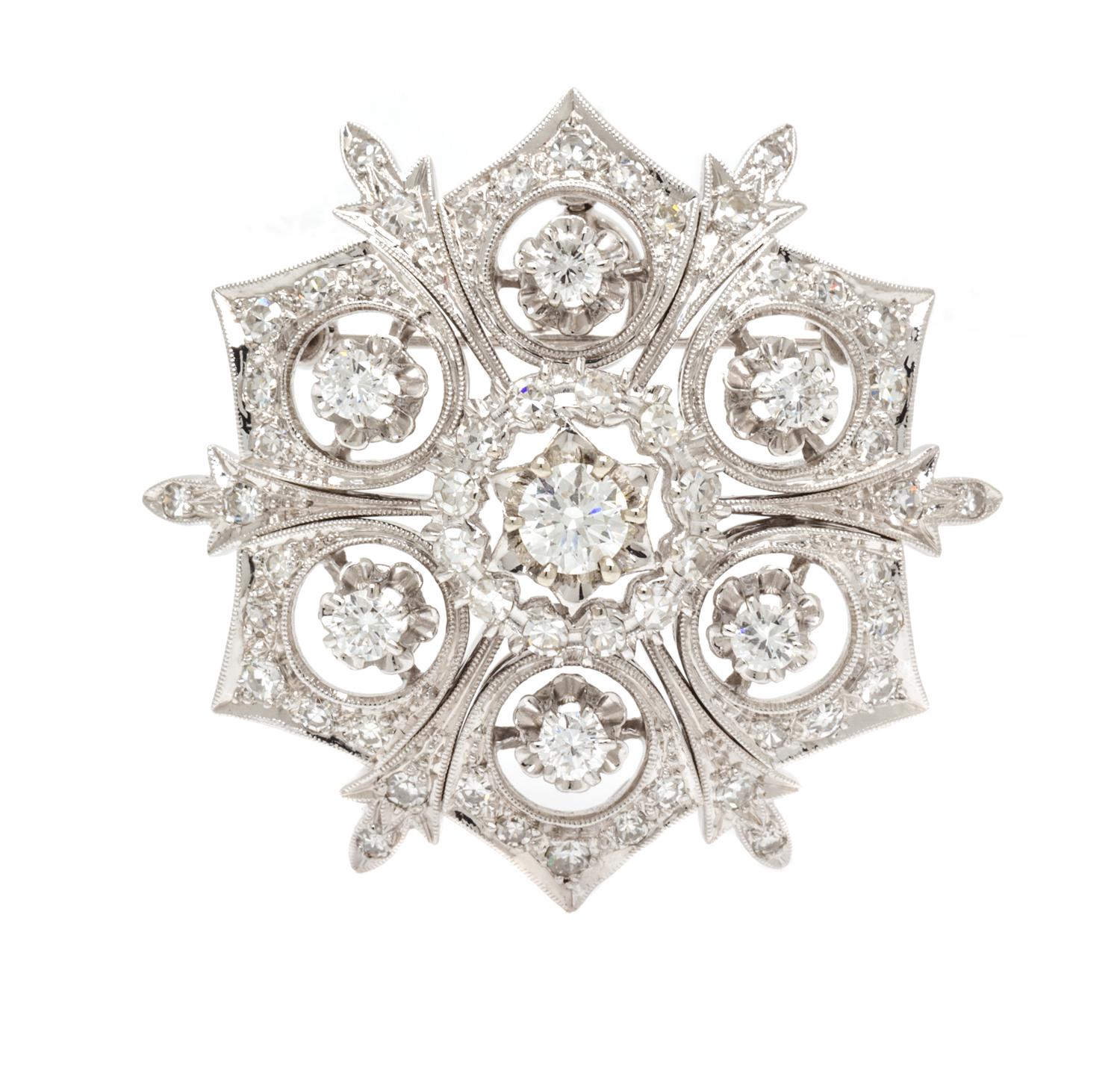 A White Gold and Diamond Pendant/Brooch, 12.10 dwts.