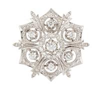 A White Gold and Diamond Pendant/Brooch, 12.10 dwts.