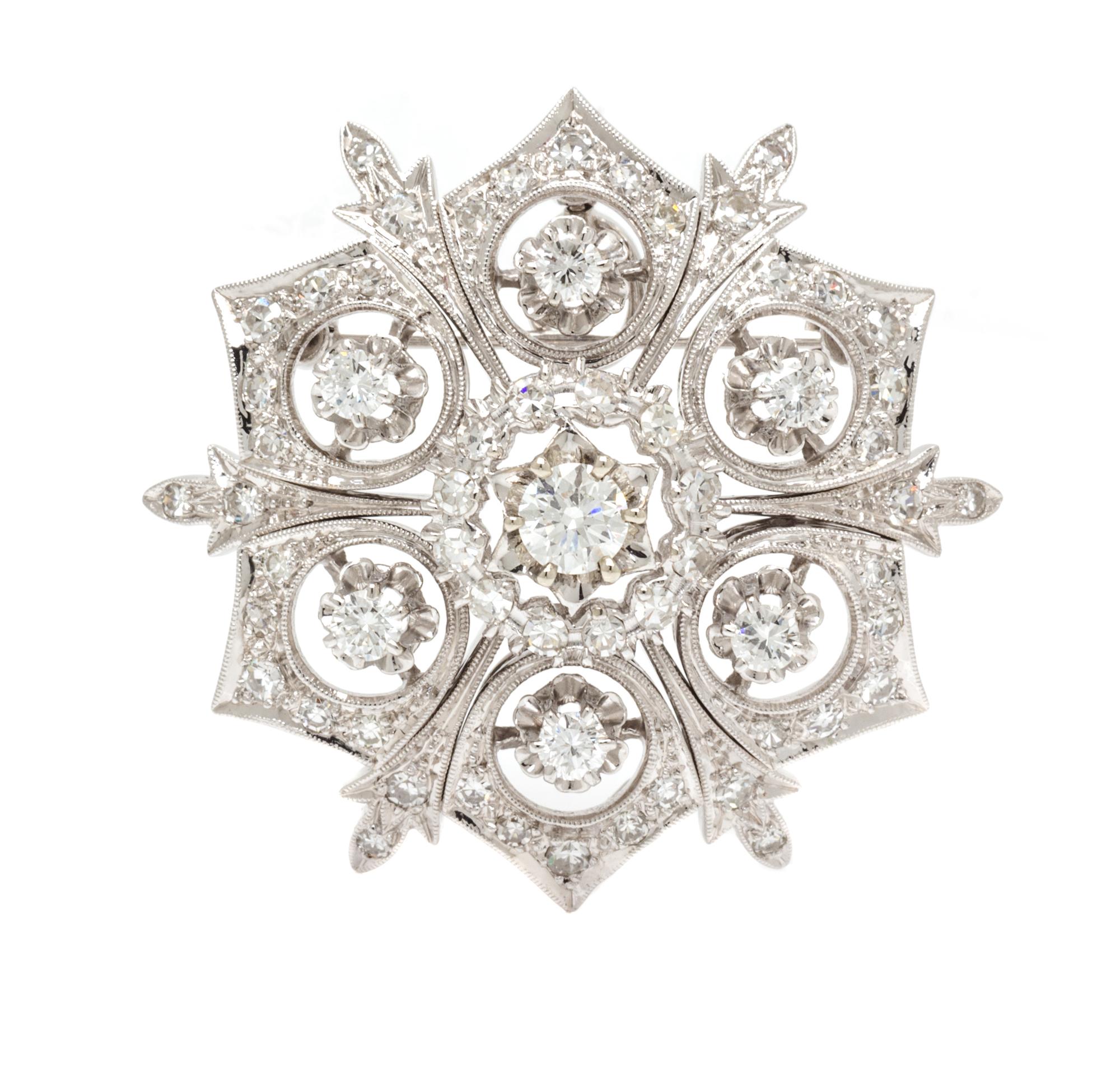 A White Gold and Diamond Pendant/Brooch, 12.10 dwts.