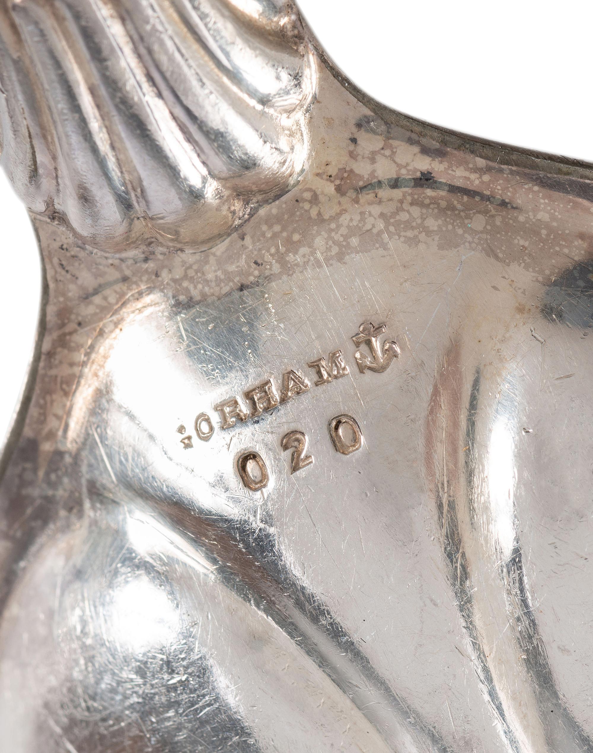 Eight American and Continental Silver and Silverplate Wood-Handled Serving Utensils