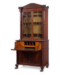 A Regency Carved and Figured Mahogany Secretary Bookcase
