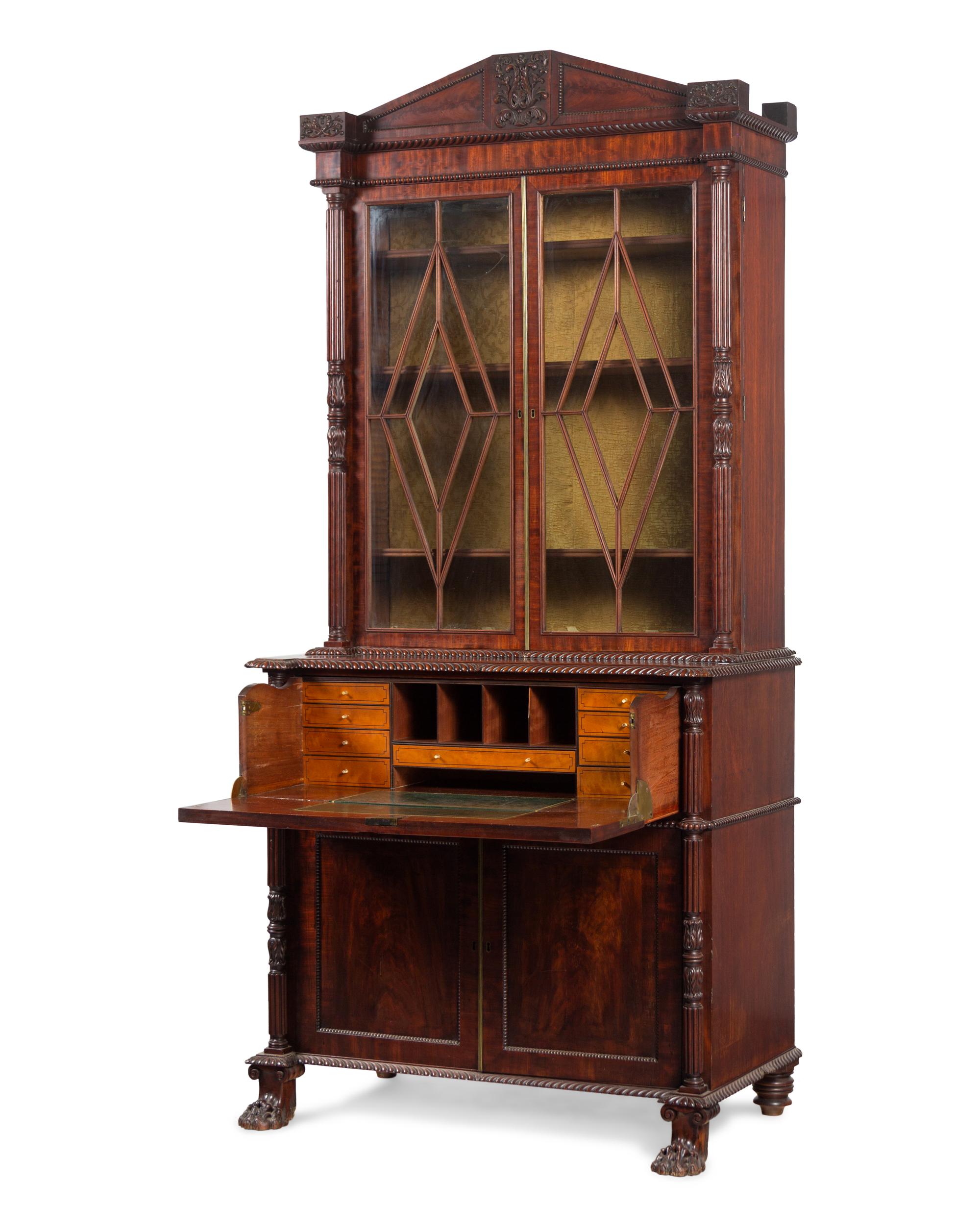 A Regency Carved and Figured Mahogany Secretary Bookcase
