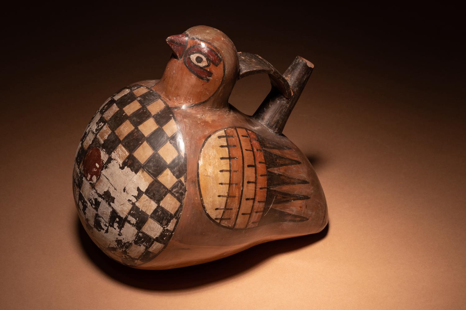 A Nazca Polychrome Terracotta Bird Stirrup Vessel