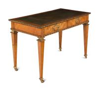 An English Gilt Bronze Mounted Satinwood Writing Table in the Louis XVI Taste