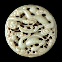 A Chinese Carved Greyish Celadon Jade 'Dragon' Roundel 青灰玉龍紋牌