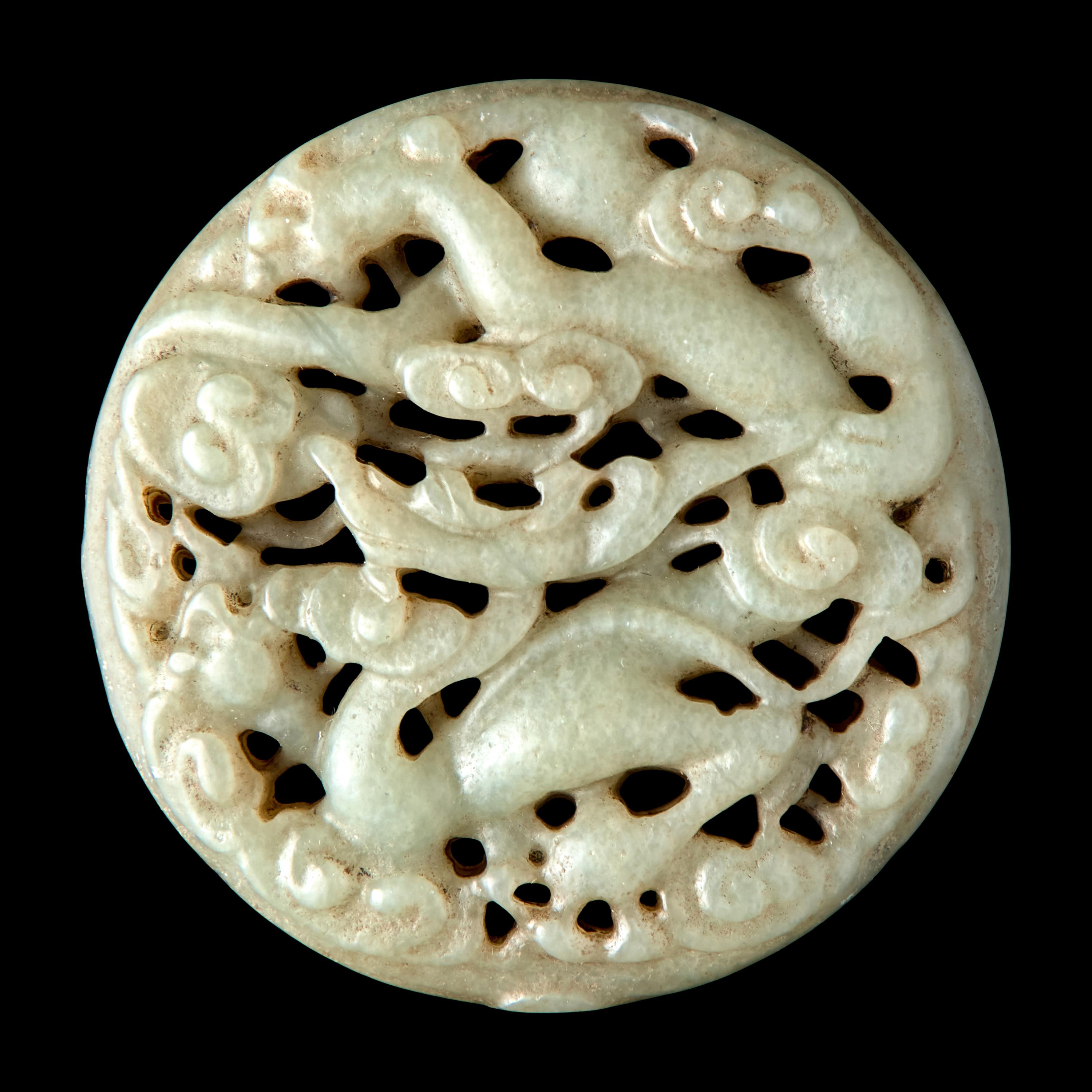 A Chinese Carved Greyish Celadon Jade 'Dragon' Roundel 青灰玉龍紋牌