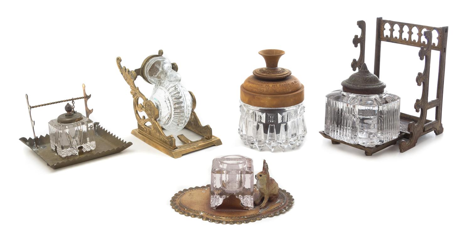 A Group of Five Inkwells Height of first 5 1/8 inches.